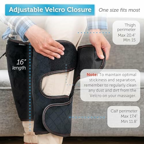 Person adjusting a leg massager with Velcro closures.