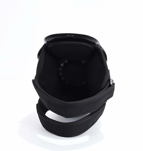 Interior view of a black helmet with straps.