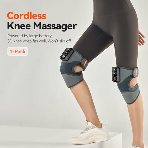 Person wearing cordless knee massager on both knees.