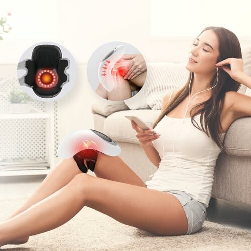 Woman using a knee massager while sitting and listening to music.