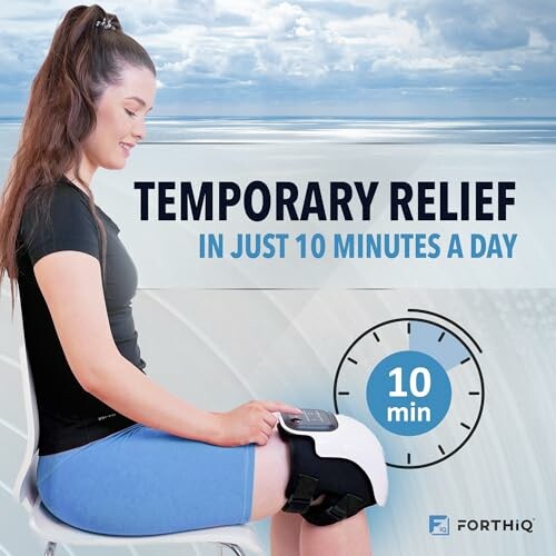 Woman using knee relief device with timer for 10 minutes.
