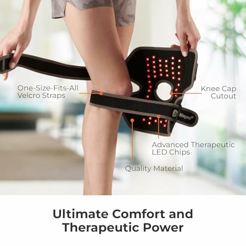 Person using a knee therapy device with LED lights and adjustable straps