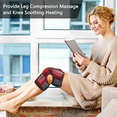 Person using knee compression and heating device while reading.