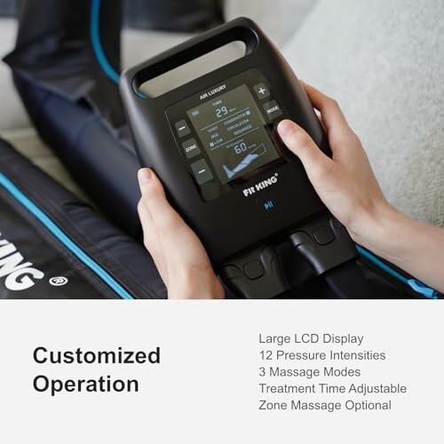 Person operating a Fit King leg massager control panel.