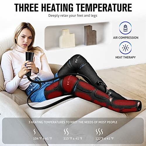 Woman using a leg massager with heating and air compression on a couch.
