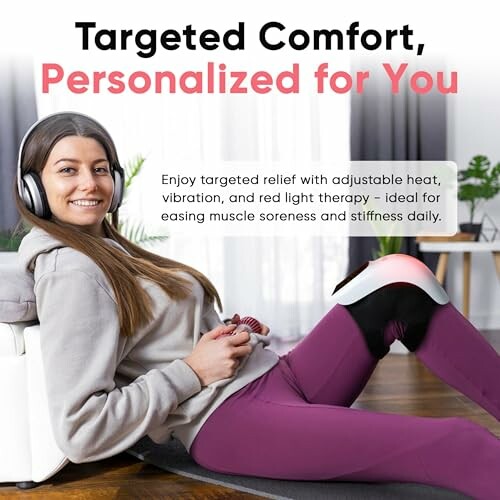 Woman using a therapy device on her knee while listening to music.
